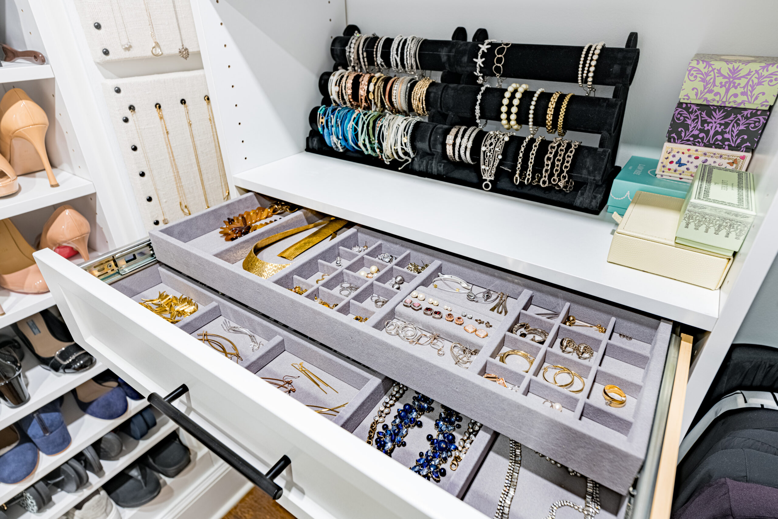 Image of closet accessory inserts in custom closet.