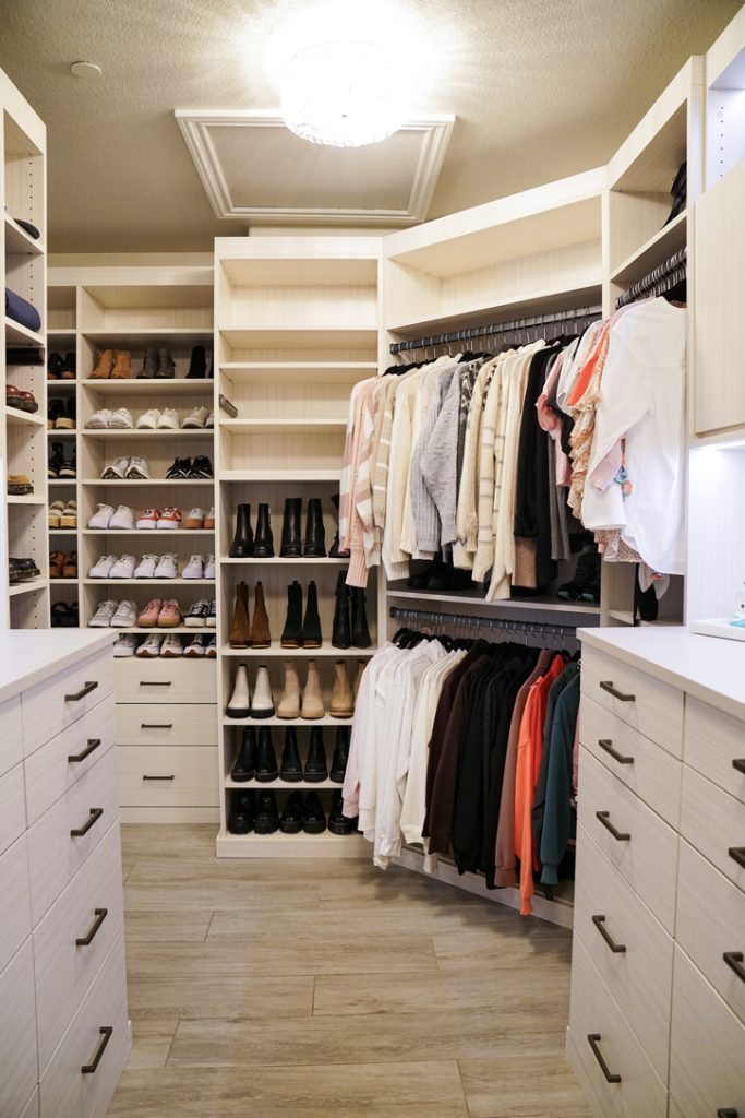 Image of a master closet with minimal space but maximum design.