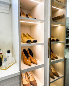 lighted shoe display in women's custom closet.